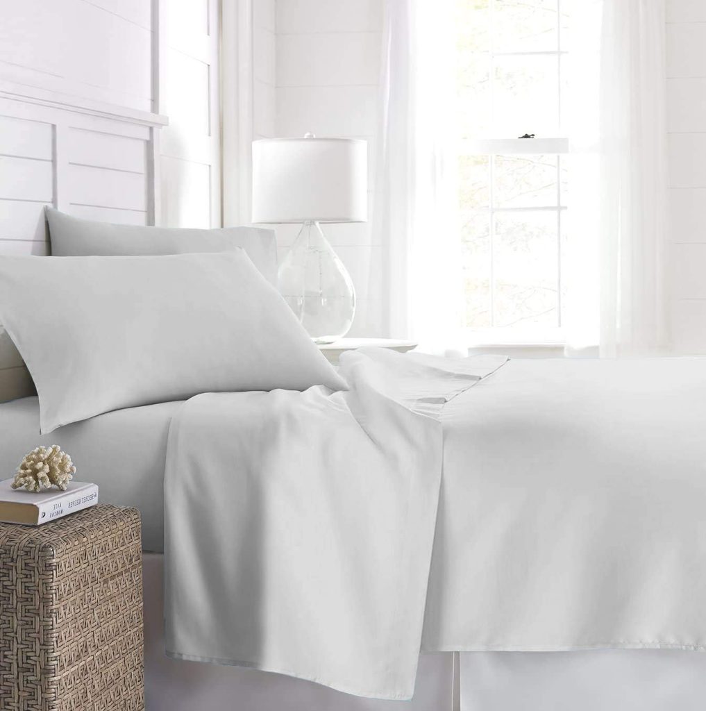Beckham Hotel Queen Sheets set with two soft, cooling sheets featuring easy-fit corners, machine washable and wrinkle-free